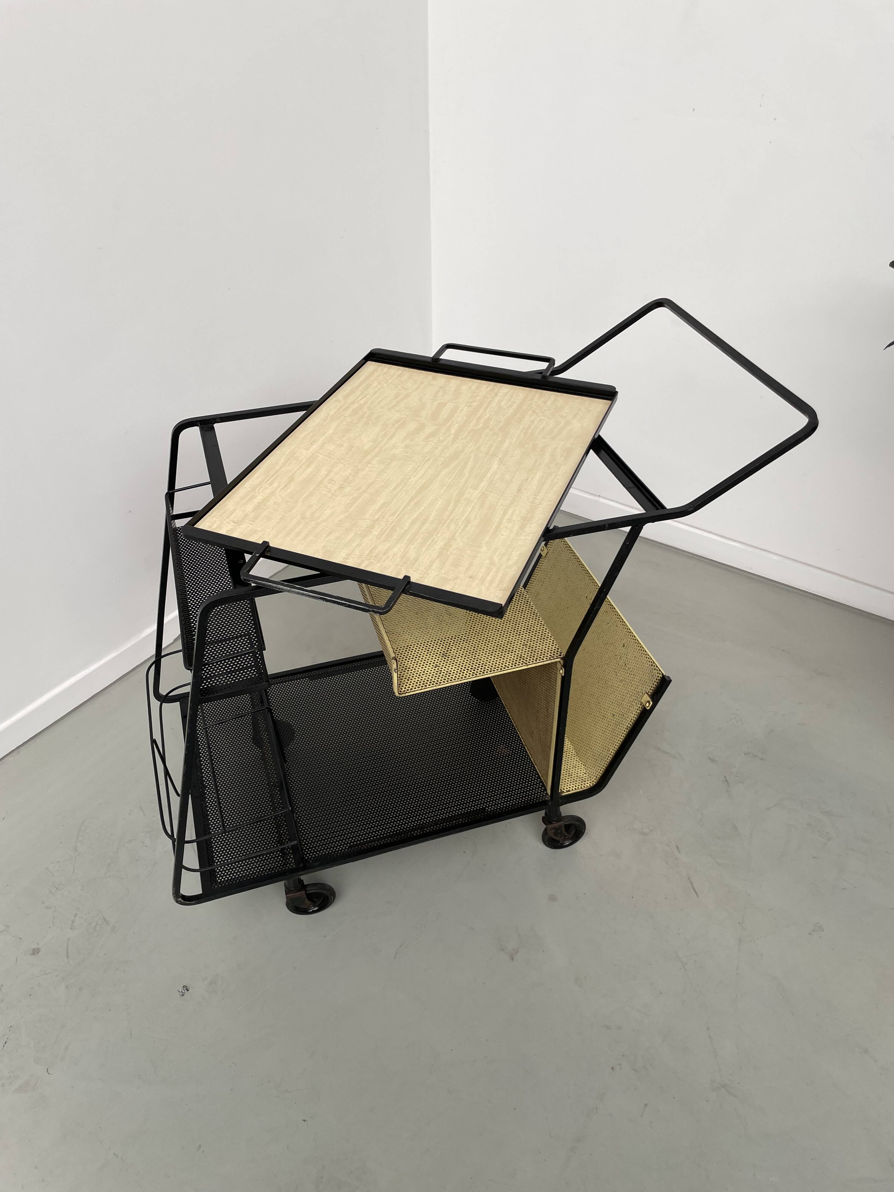 Perforated metal serving trolley in the Mathieu Matégot style