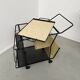 Perforated metal serving trolley in the Mathieu Matégot style