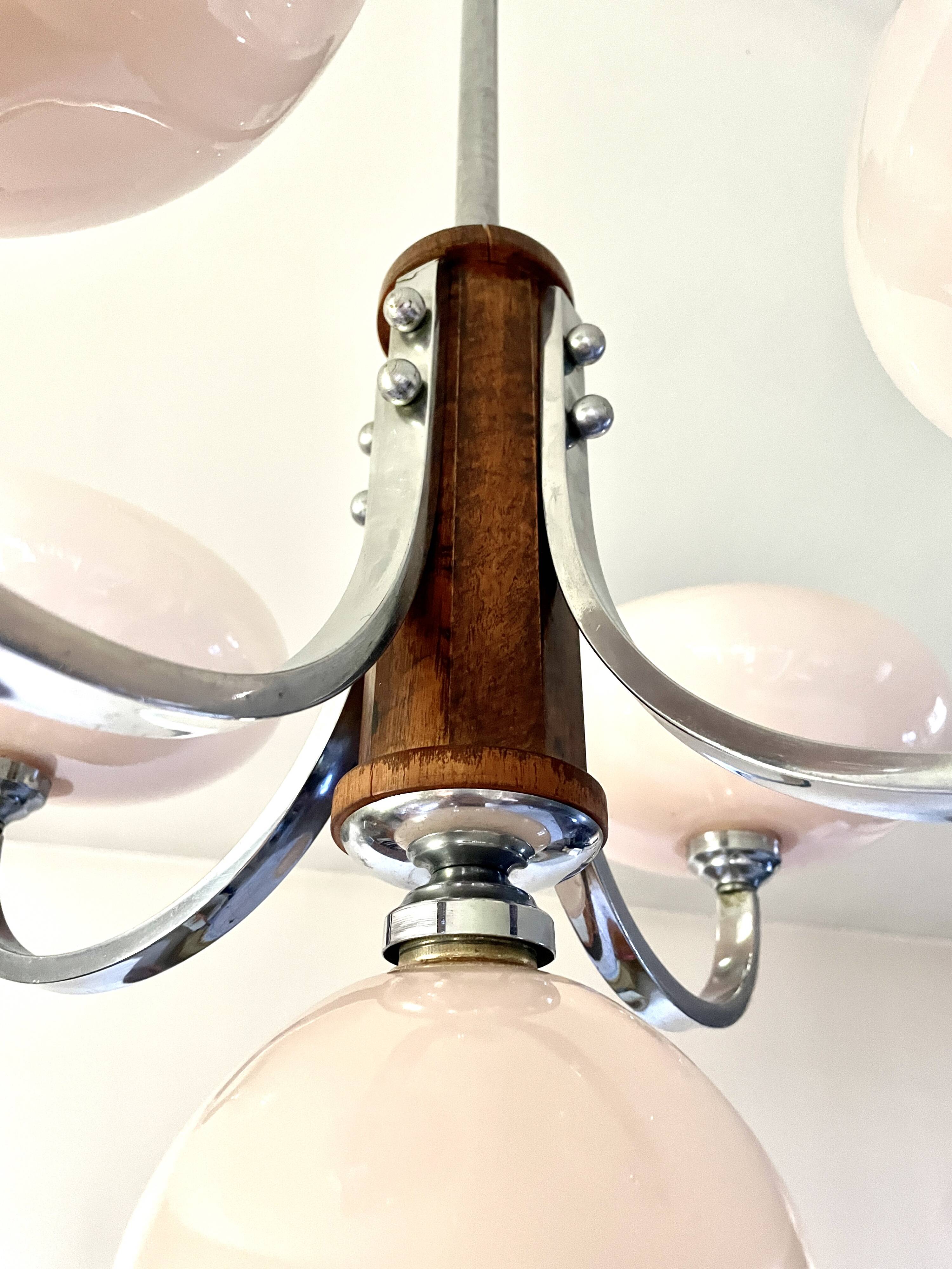 Art Deco lustre with pink glass, wood, and chrome from the 1930s.
