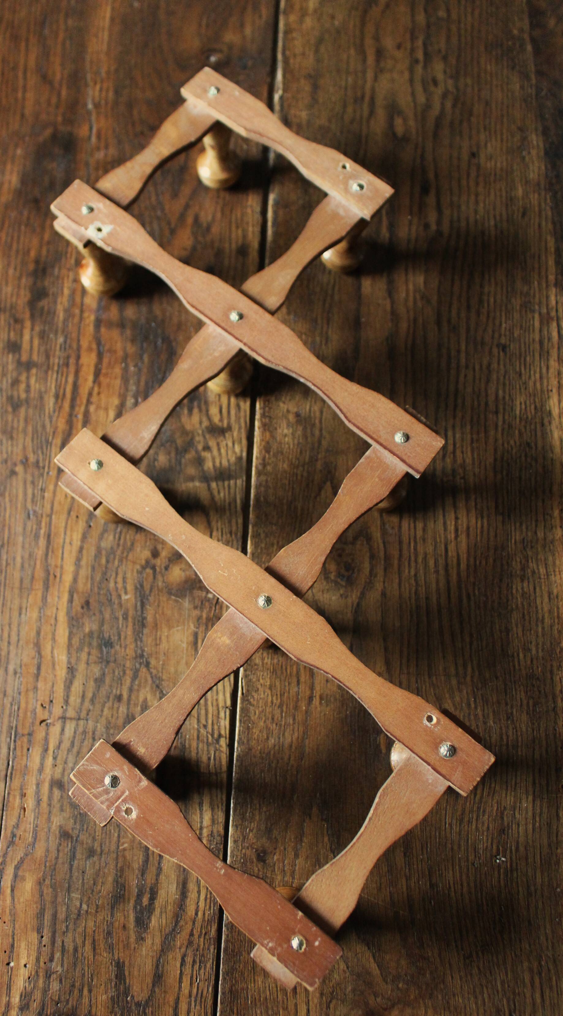 Vintage wooden ball accordion coat rack