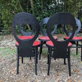 6 vintage Baumann seagull model chairs, black lacquered with red Skai seats.