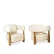Pair of “bean” shaped armchairs, in blond beech. Contemporary work.