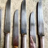 6 silver metal knives
