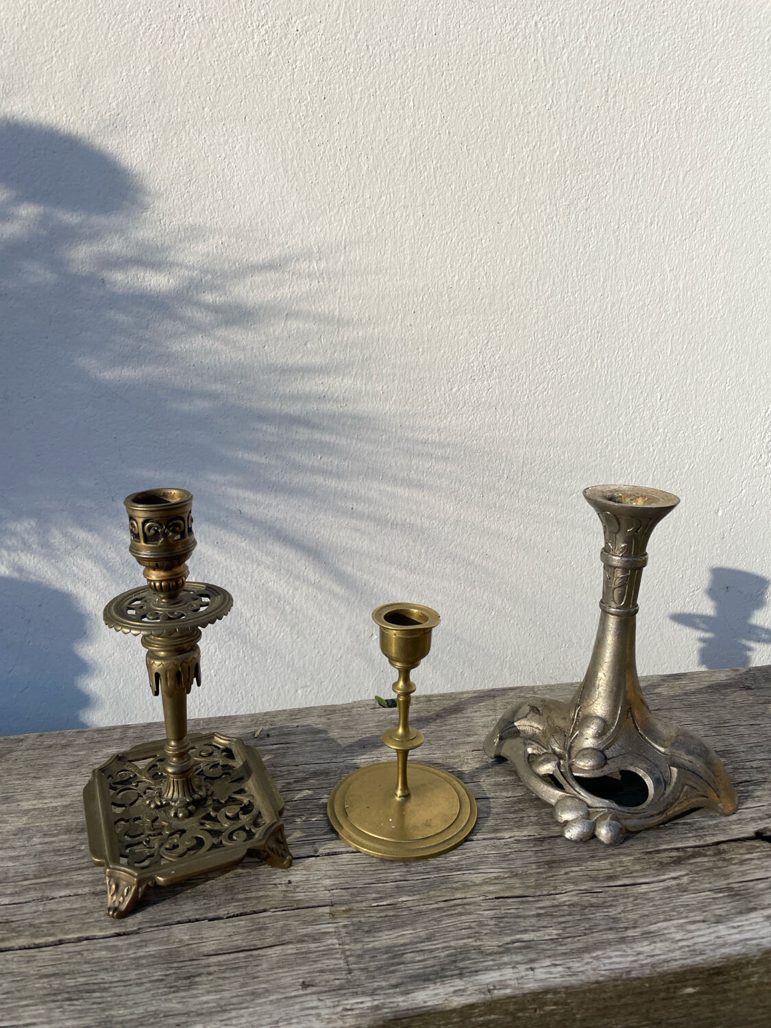 3 antique candlesticks in gold and silver metal