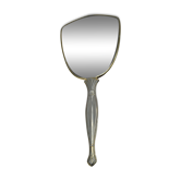 Antique hand mirror with stitched glass
