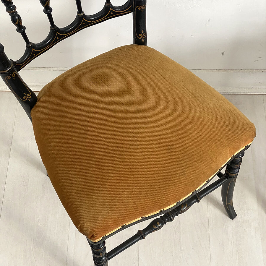 Pair of Napoleon III chairs called "Chiavari" in blackened wood