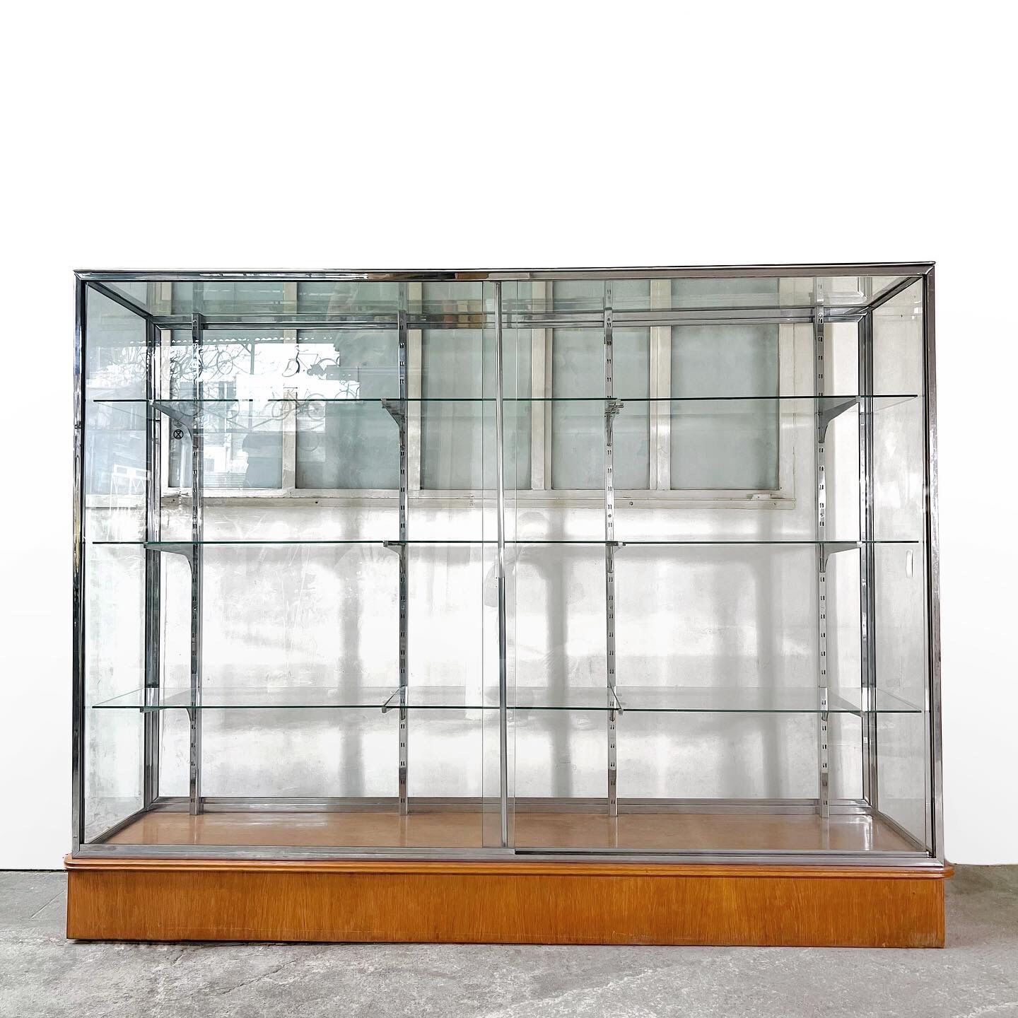 Glass & chrome showcase, 1980