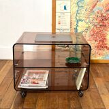 Smoked Plexiglas coffee table on wheels -