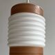 Opaline corrugated tube suspension