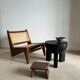 Black mango wood tripod side table with a semi-spherical top, height: 45 cm, diameter: 44 cm.