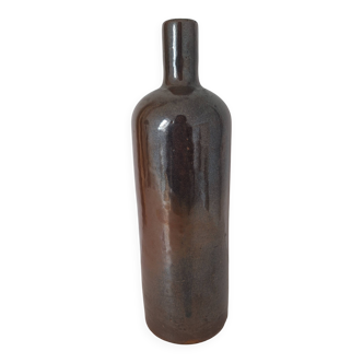 Dark brown and black stoneware bottle