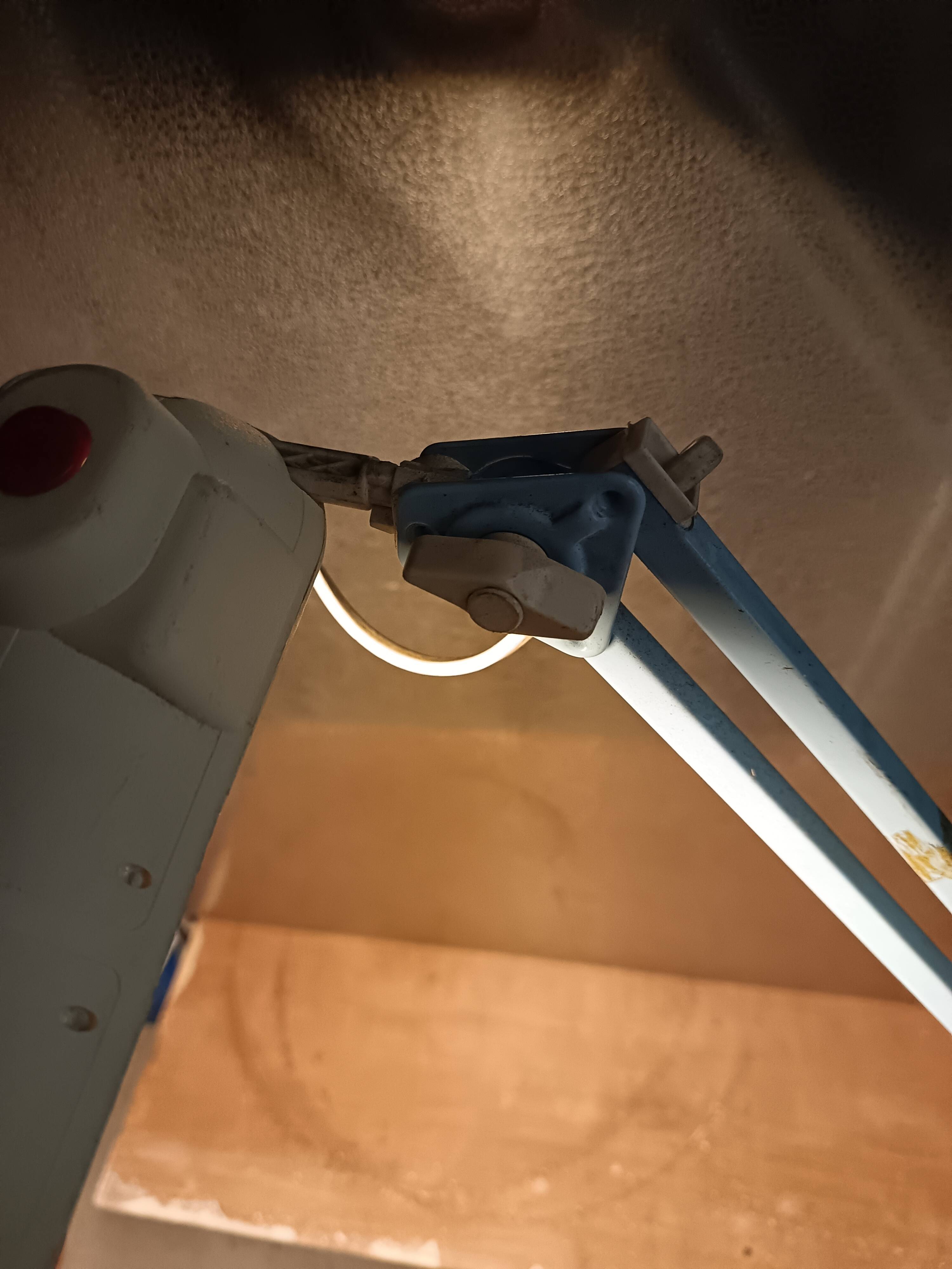 Articulated blue desk lamp