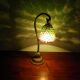 Lampe à poser, pied en fonte et abat jour en perles années 60