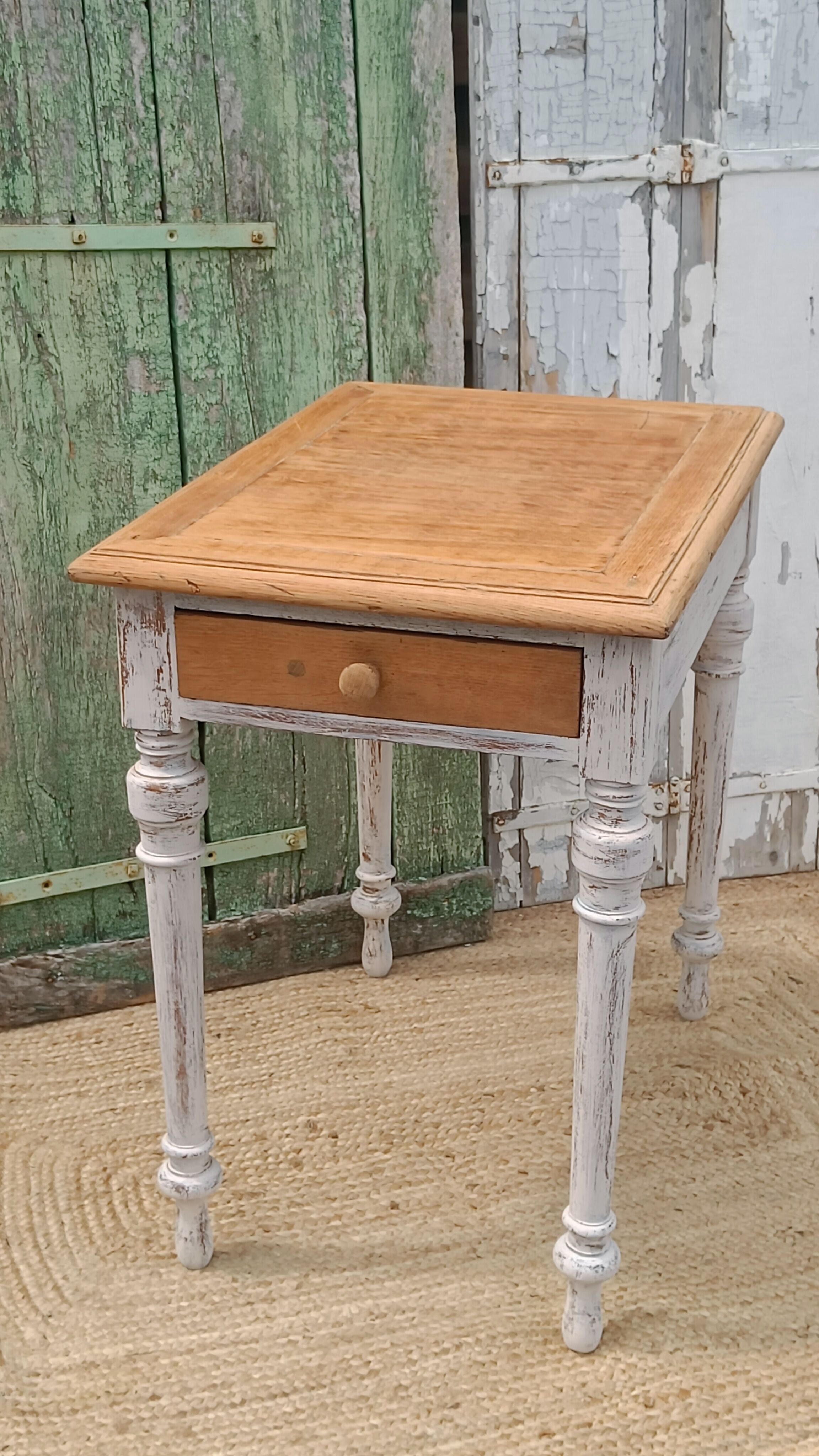 Antique drawer table with a patina.