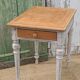 Antique drawer table with a patina.