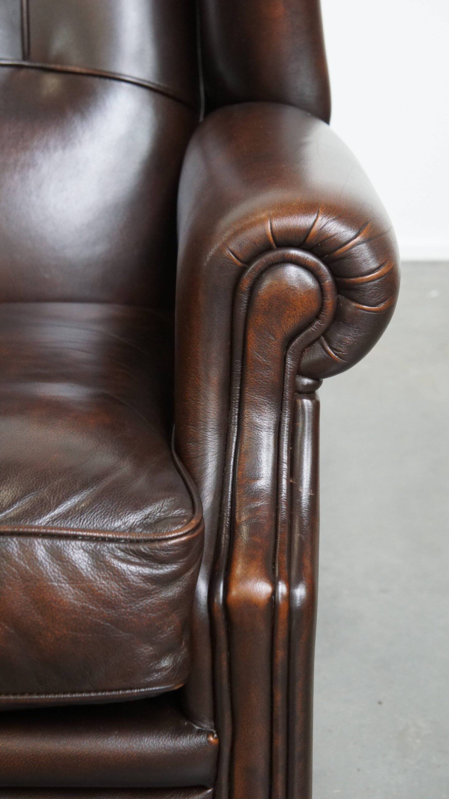 Comfortable and very beautiful set of 2 cow leather wingback armchairs in English style