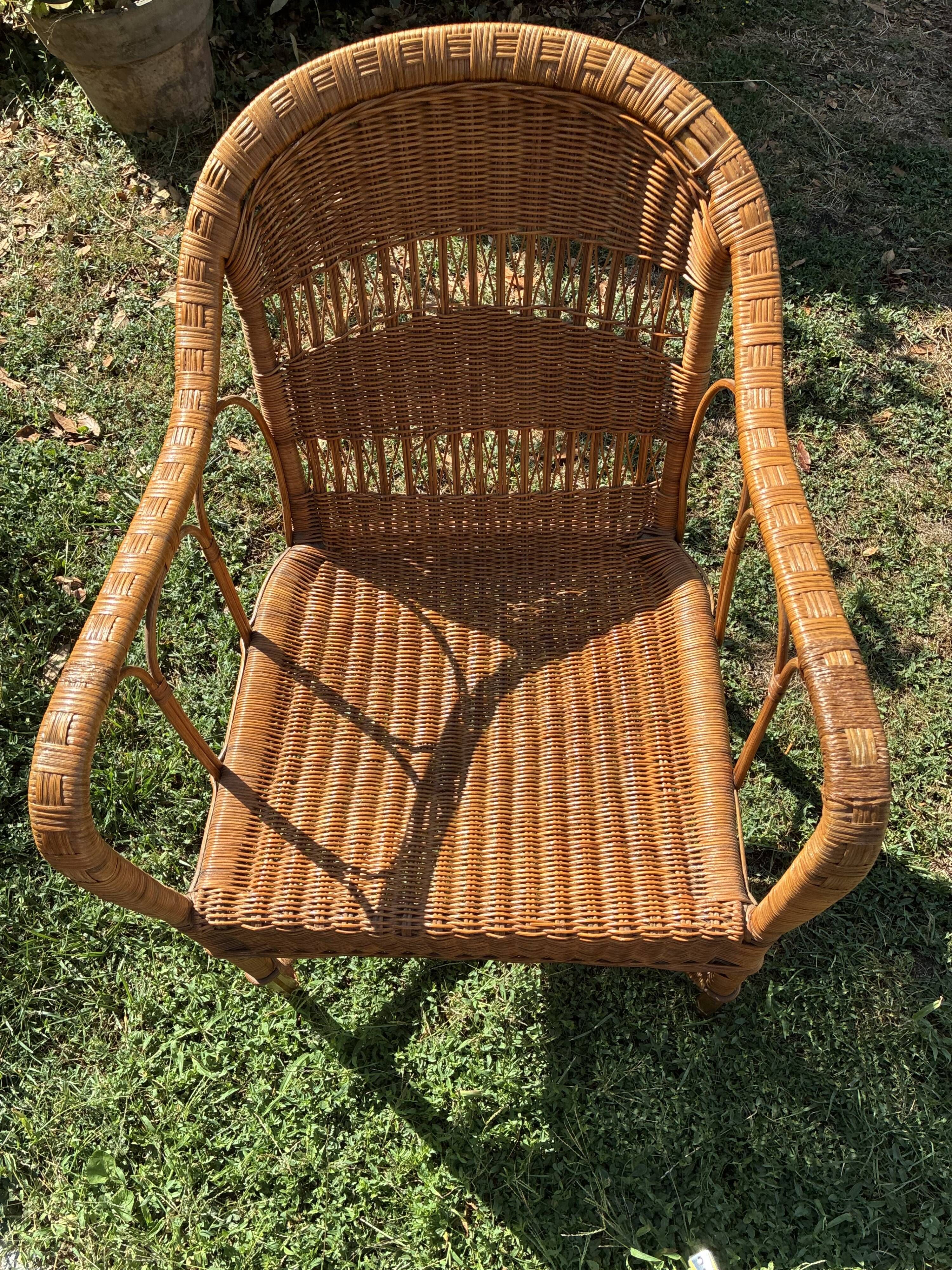 Vintage colonial lounge chair in rattan, pre-1950s.