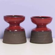 set x2 brown & red stoneware candlestick
