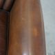 Sheep leather armchair finished with decorative nails