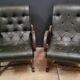 Pair of English Chesterfield armchairs in leather and solid wood