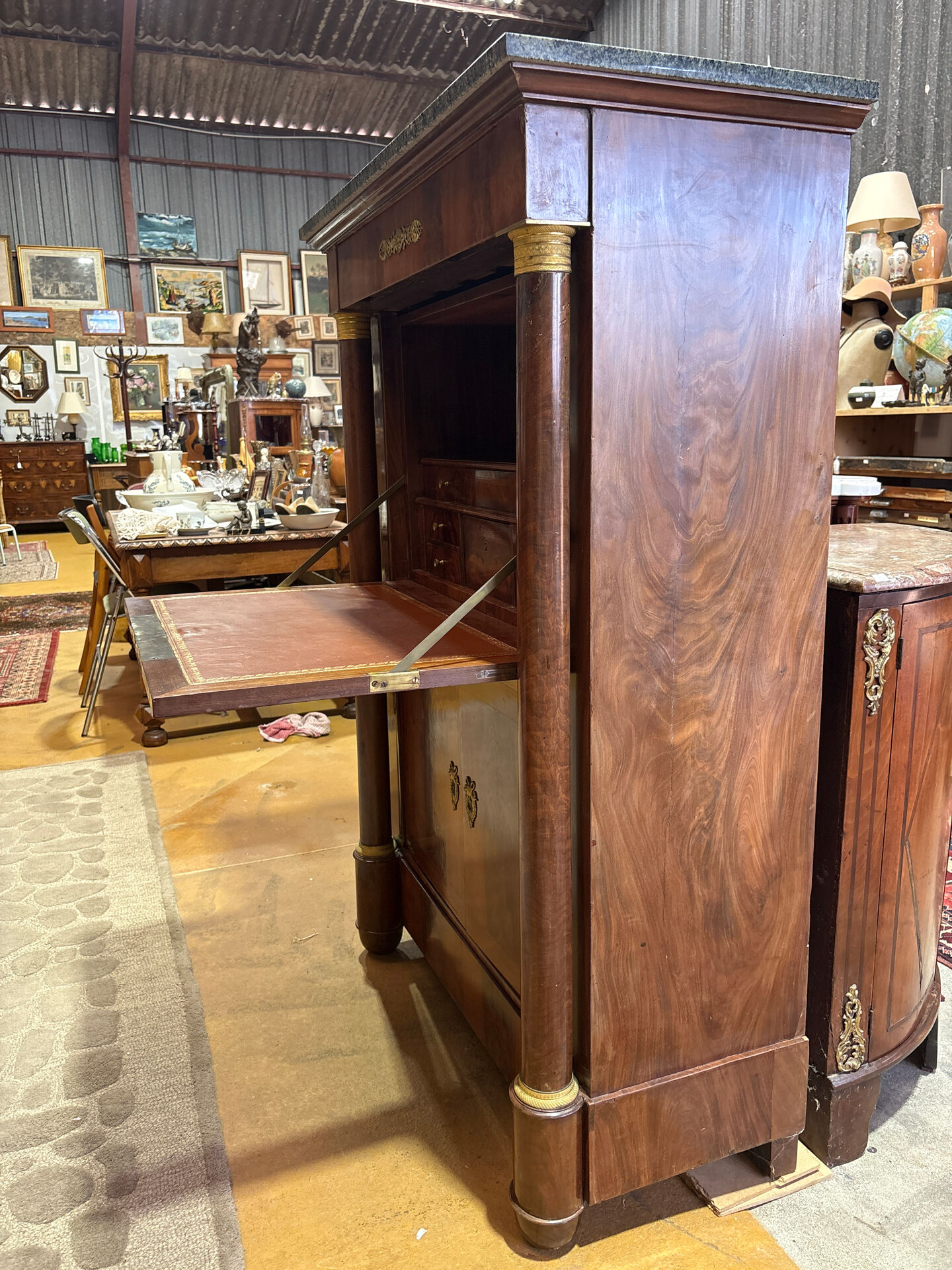 Empire secretary in mahogany, bronze and marble with secret drawers.