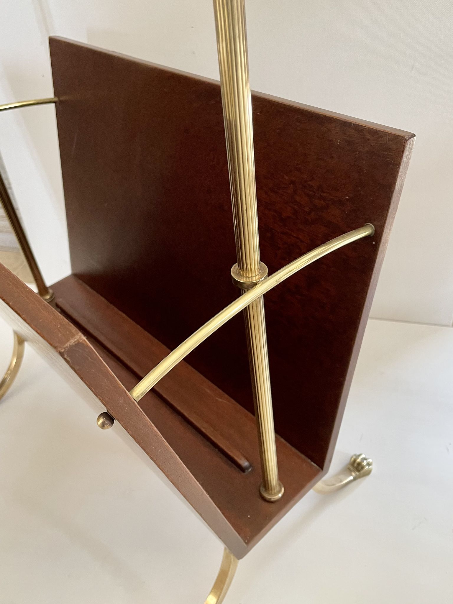 Magazine racks with claw feet by Maison Jansen