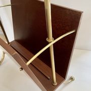 Magazine racks with claw feet by Maison Jansen