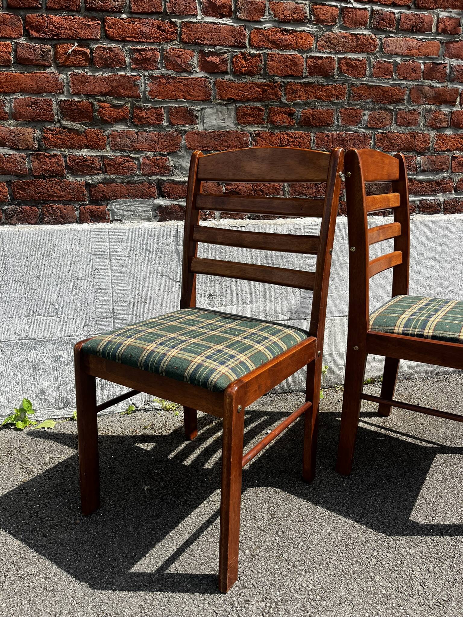 Lot of 3 vintage checkered wood and fabric chairs.