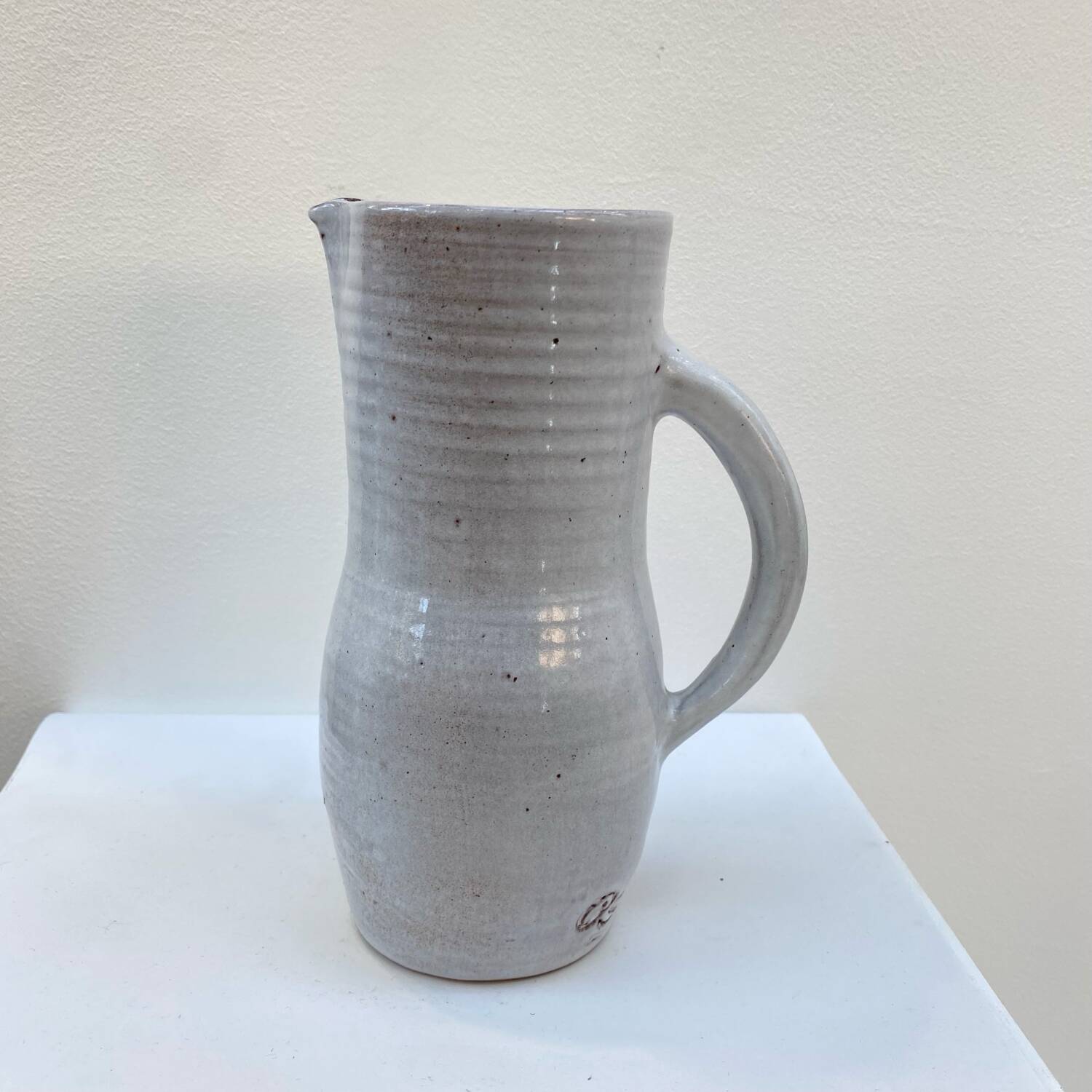 Enameled stoneware pitcher by Jeanne and Norbert Pierlot