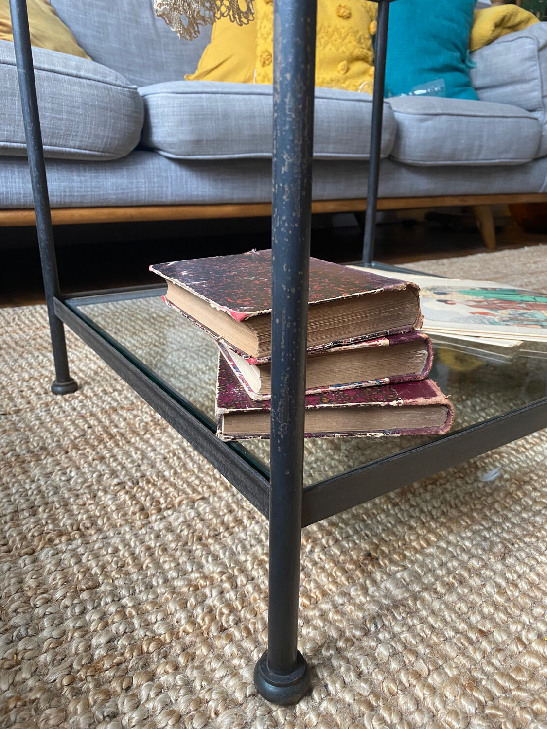 Glass and wrought iron coffee table design