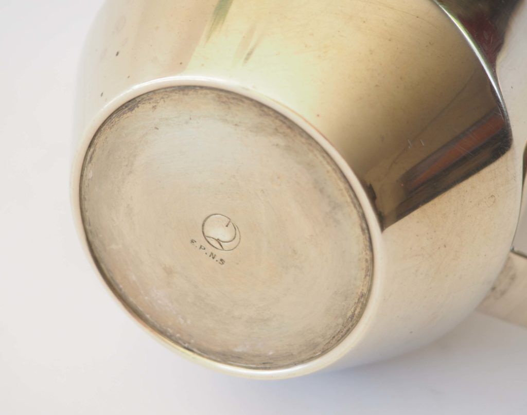 Duo of bronze pitchers