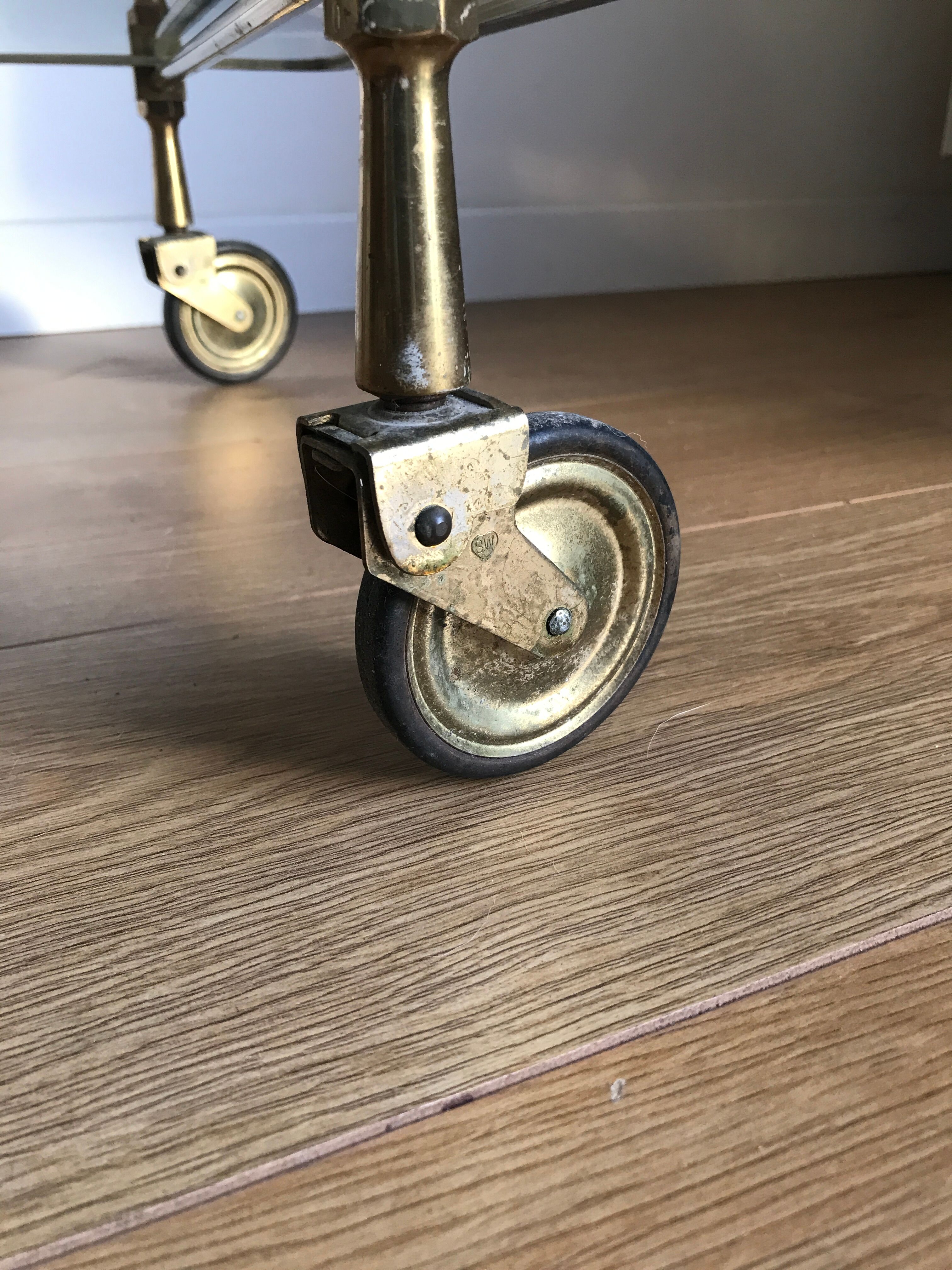 Vintage rolling golden and black dessert in brass and glass