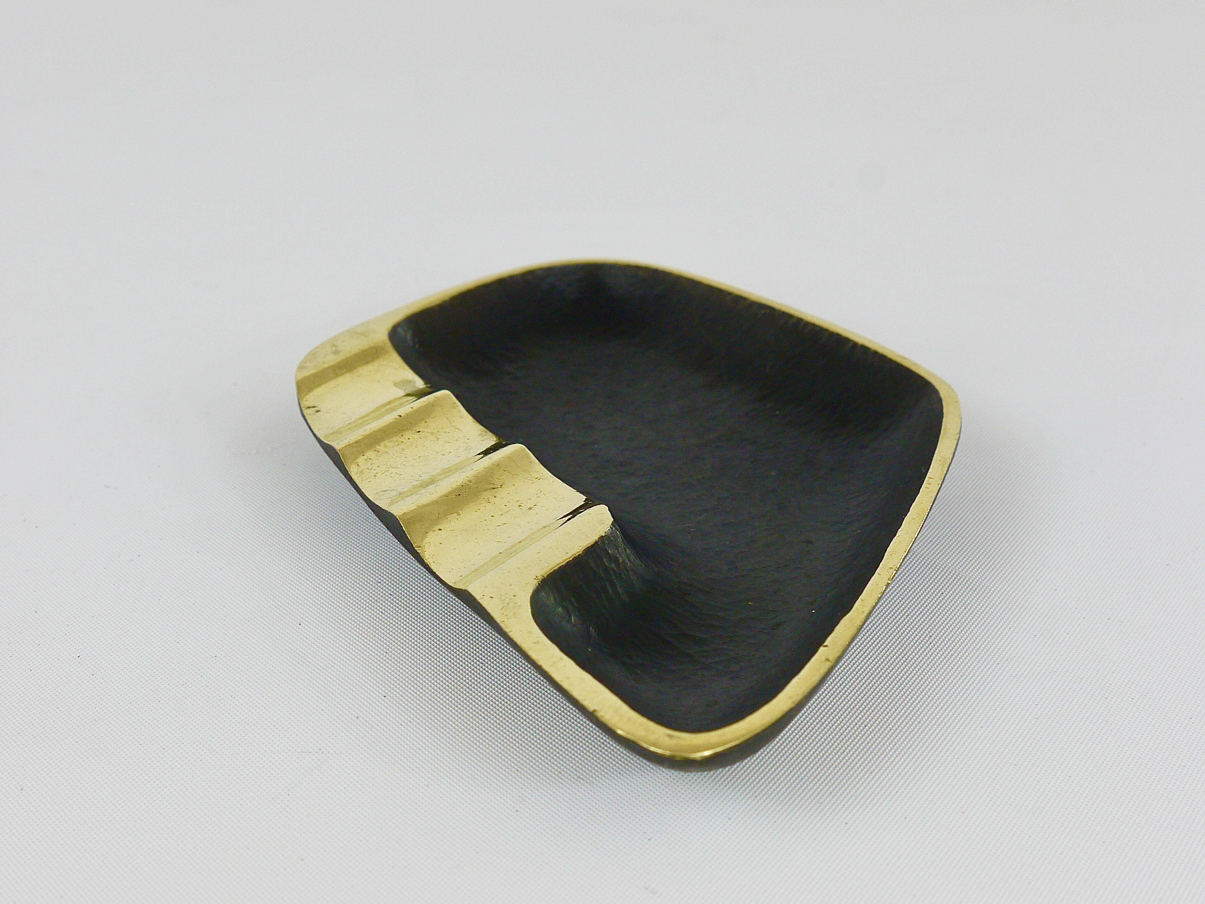 Asymmetrical modernist ashtray by Walter Bosse in black brass by Herta Baller, 1950s.
