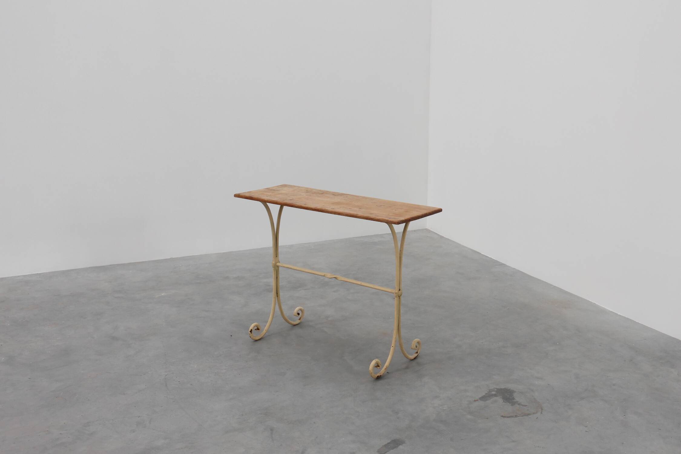 20th century French bistro table with cast iron base and oak top