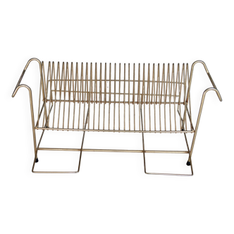 Vintage magazine rack or vinyl record holder in gold metal