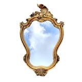 Old wall mirror in golden resin rococo style - made in france