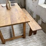 Oak farmhouse table and its two benches
