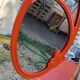 Vintage mirror enamelled cast iron orange