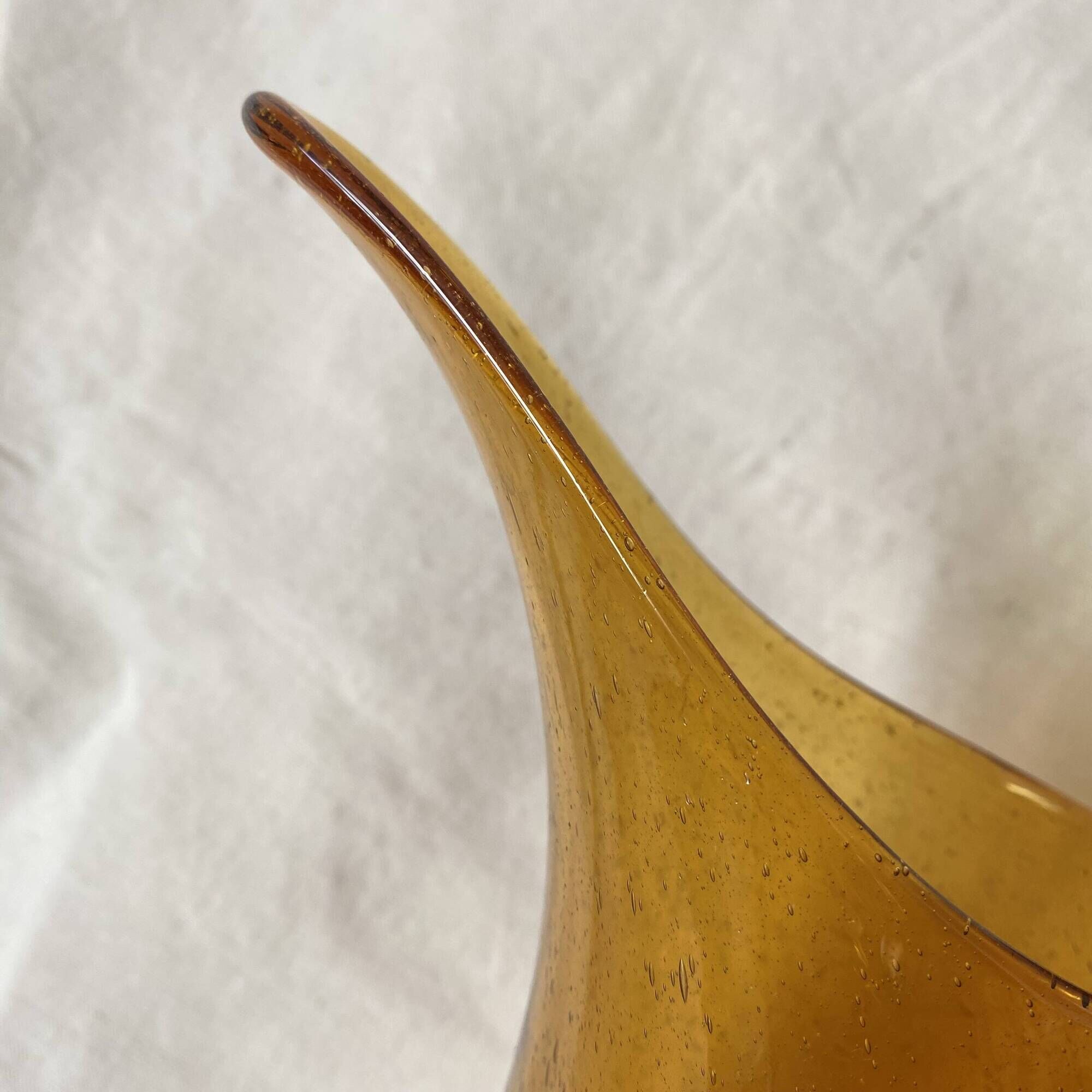 Blown glass jug with caramel bubbles