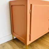 Terracotta painted wooden sideboard