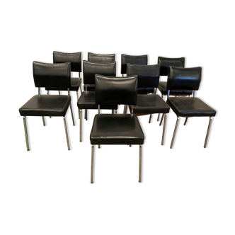 Suite of nine vintage chairs in chrome and imitation leather XX century