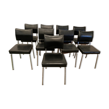 Suite of nine vintage chairs in chrome and imitation leather XX century