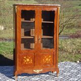 Glass library with rosewood marquetry in the Louis XV style.