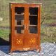 Glass library with rosewood marquetry in the Louis XV style.