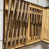 Box of silver metal knives