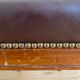 Vintage office chair in wood and brown studded leather late nineteenth
