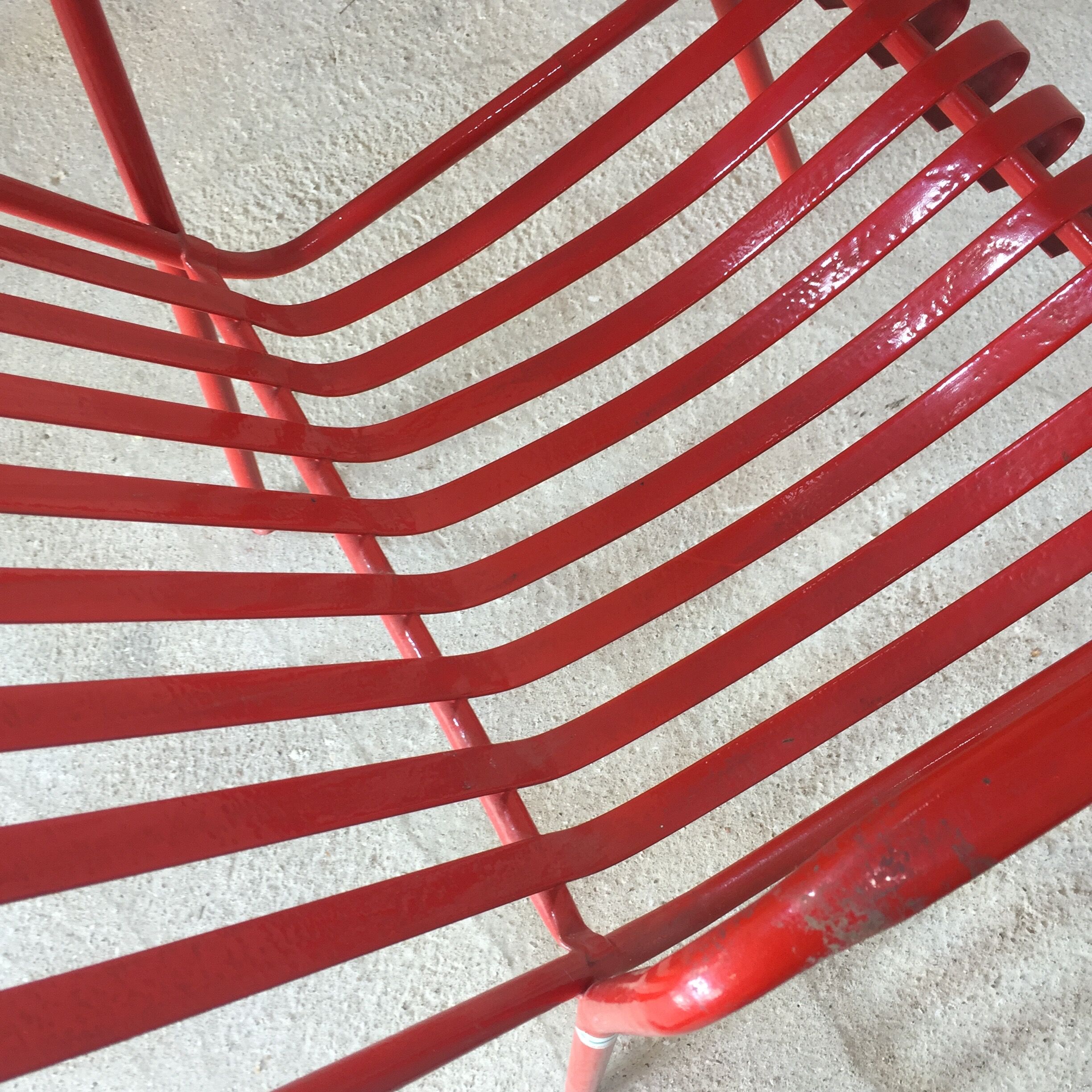 1960s red metal chair published by Stil Garden