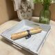 Old wooden tray with aged white patina