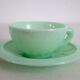 10 almond green opaline cups and saucers from the 50s