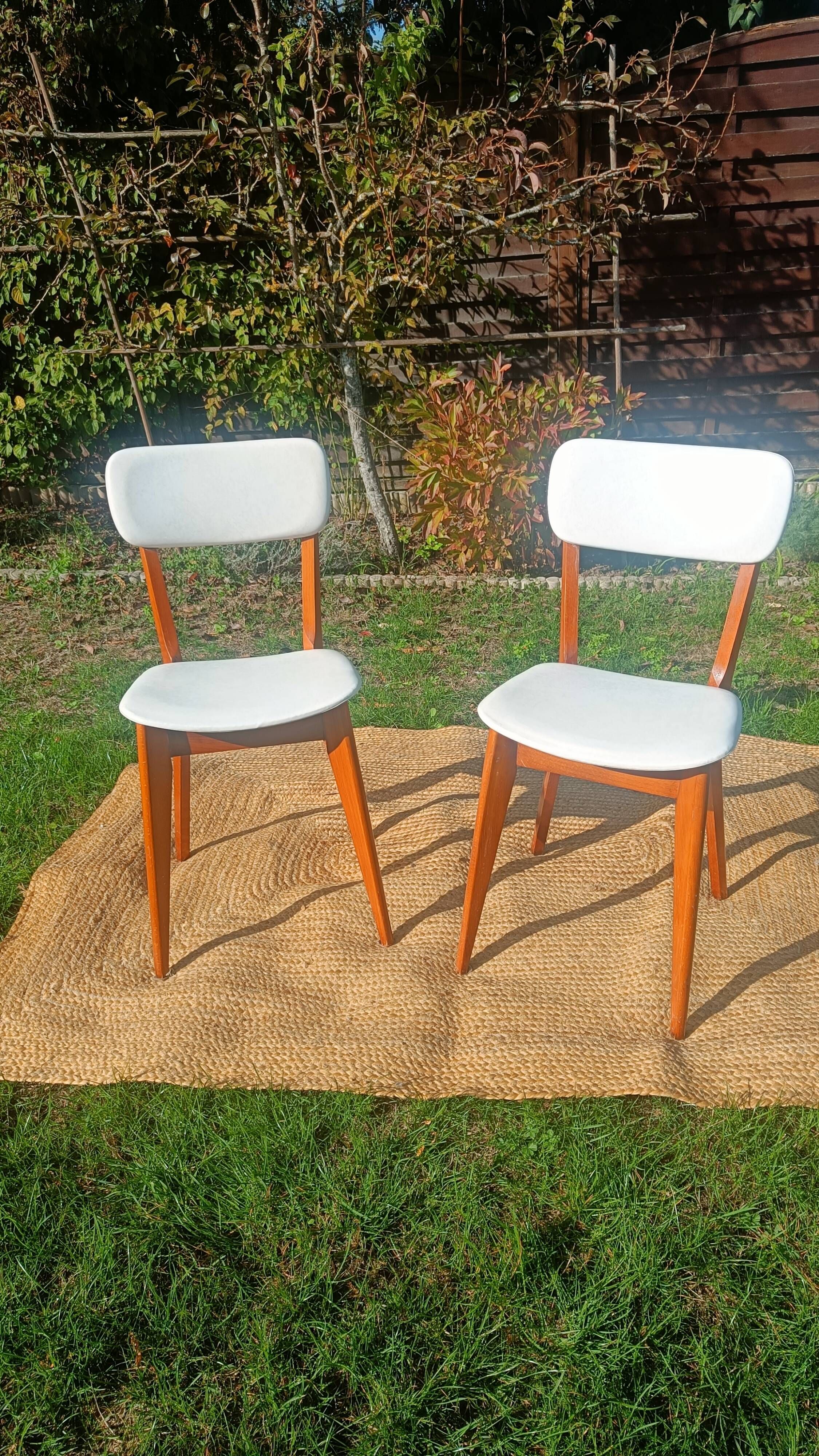 vintage wooden chairs with white faux leather